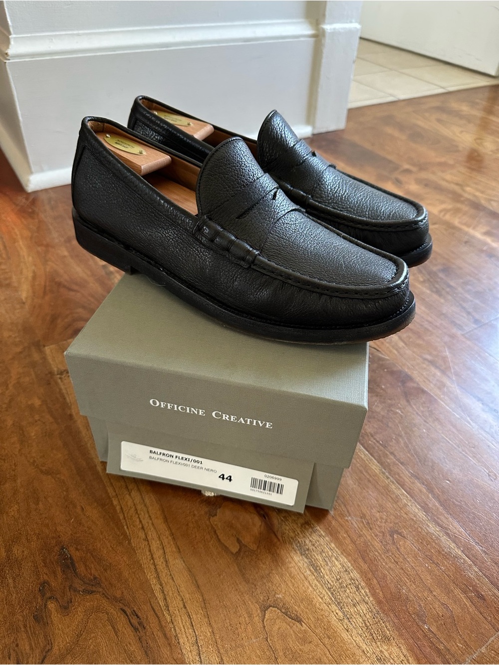 Officine Creative Black Pebbled Leather Penny Loafers